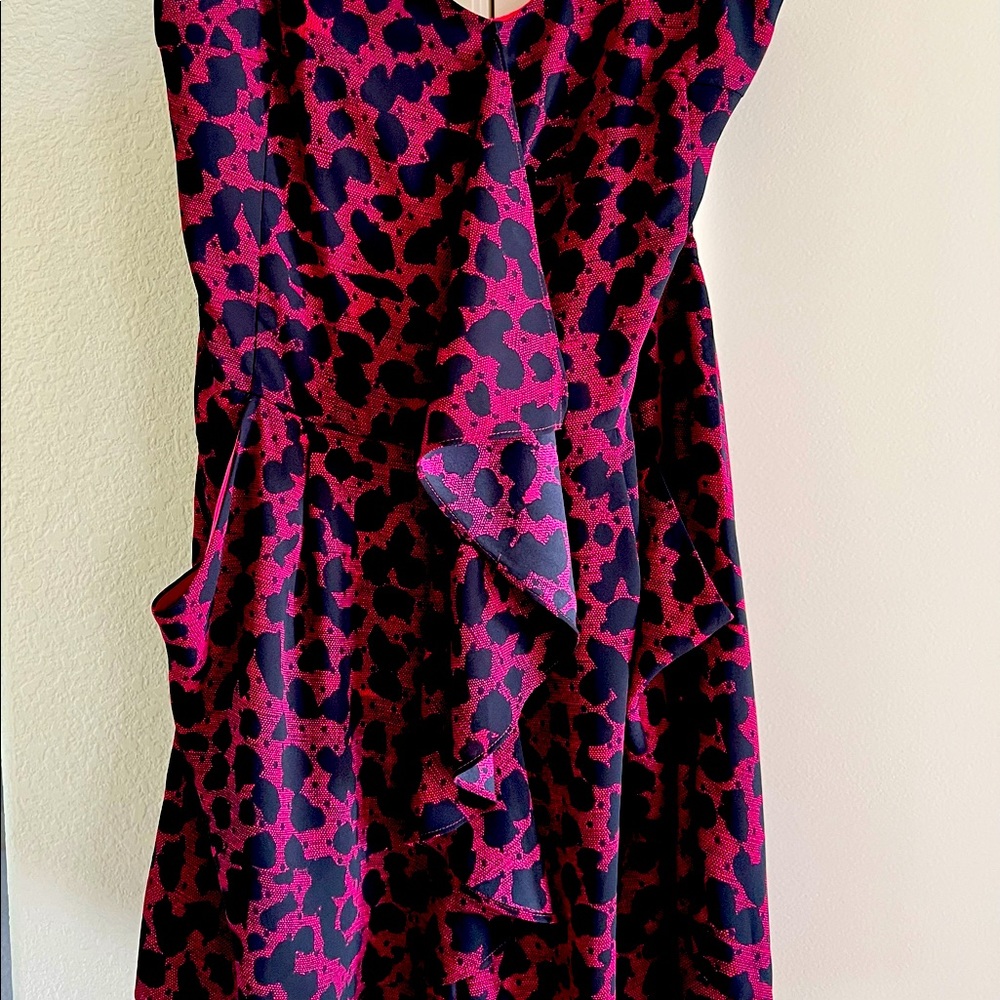 Express brand ROMPER in fuschia/black leopard print. Size M.